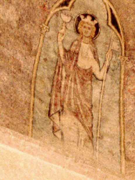 L'Eglise triomphante, droite, couronnée et nimbée, tenant un calice