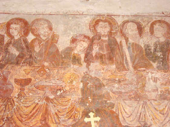 La Cène (partie centrale) A droite du Christ, Saint Jean penché sur son épaule, Saint Pierre et son énorme clef et un autre apôtre. A gauche du Christ, Saint Paul, qui est l'intrus, et un apôtre